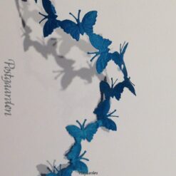 Tyrkis sommerfugle i bånd