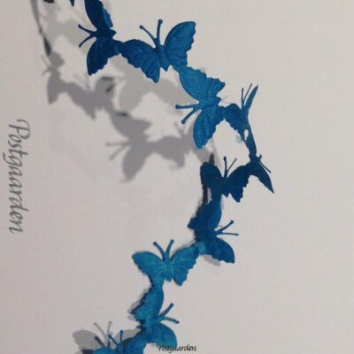 Tyrkis sommerfugle i bånd