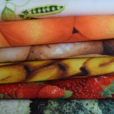 Frugt og grønt patchworkstof