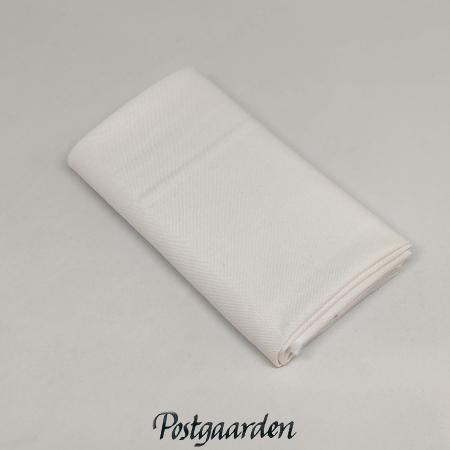 Kona Snow råhvid ensfarvet bomuldsstof fra Postgaarden.com