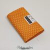 7306 Orange patchworkstof med ovaler