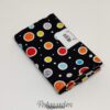 997543 Sort patchworkstof med prikker