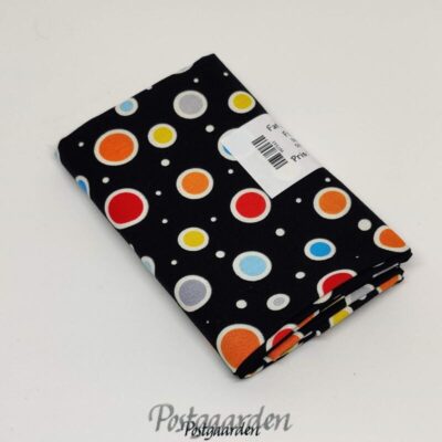 997543 Sort patchworkstof med prikker