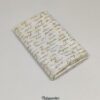 FQ5749 - Beige med brun skrift patchworkstof
