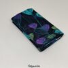 FQ7461 - Sort med tyrkis og lilla blade patchworkstof