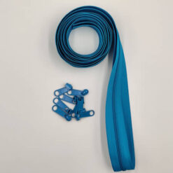 ENR-AQ Turkis lynlås med skydere - postgaarden.com