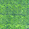 Vårgrøn patchworkstof med blå blomst bali batik - Varenummer 7990