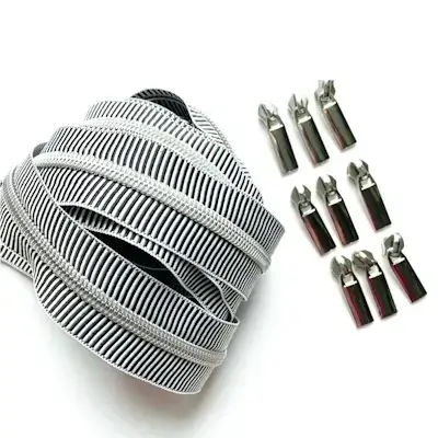 lynlås med 9 skydere i sort og hvid